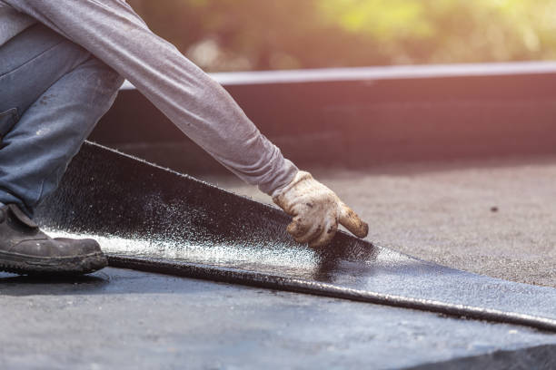 Professional Basement Waterproofing technician working in Bayport, NY